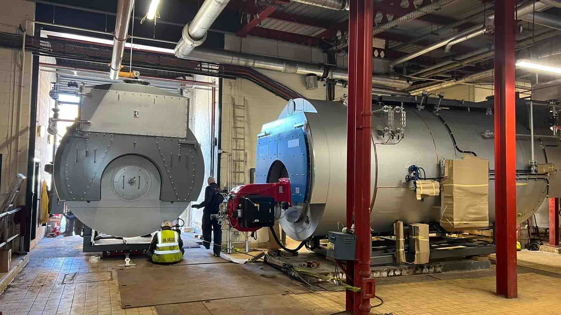 Moving machinery into a building, inside view